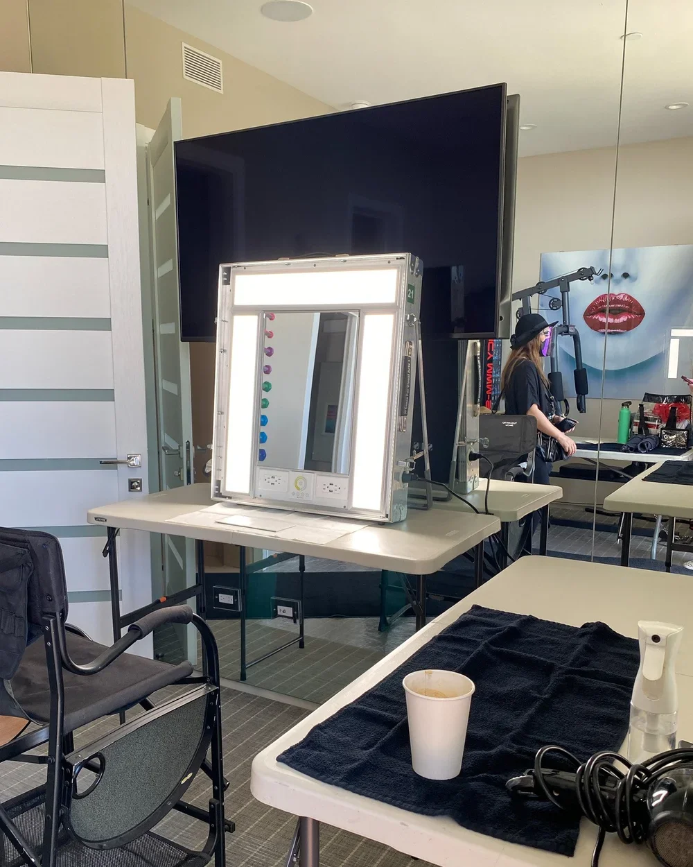 a portable makeup station on a small table