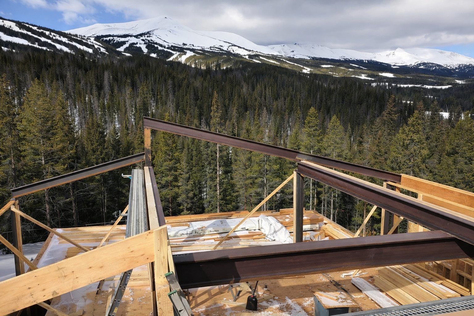 Mountain home framing construction with Rocky Mountain views by Gold Hill Builders Evergreen Colorado