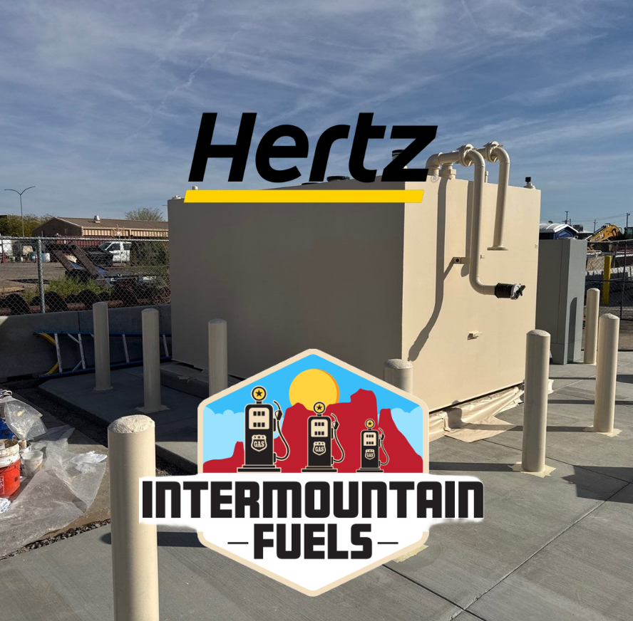 Fuel pumps with InterMountain Fuels, Avis, and Budget signage.