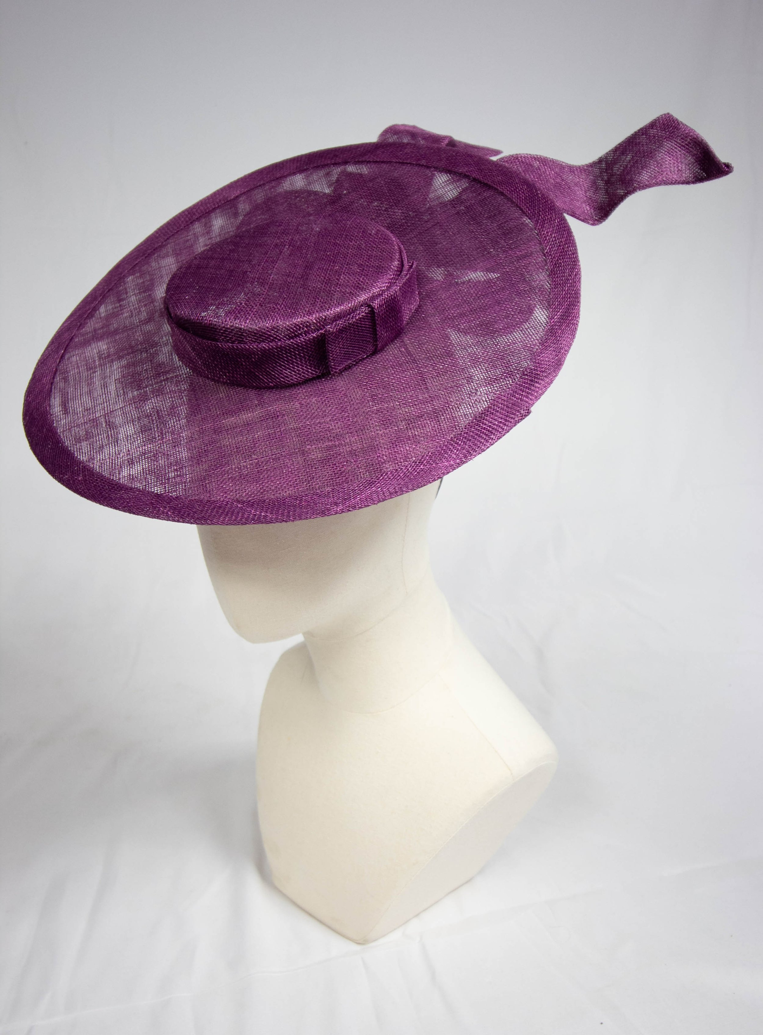 Elegant Purple Boater Hat with Sculpted Bow