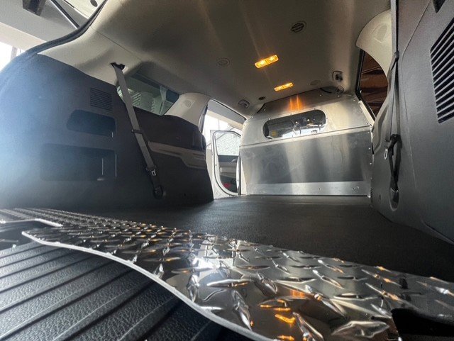 Kia Carnival Custom Floor and Partition by Medina Upfit