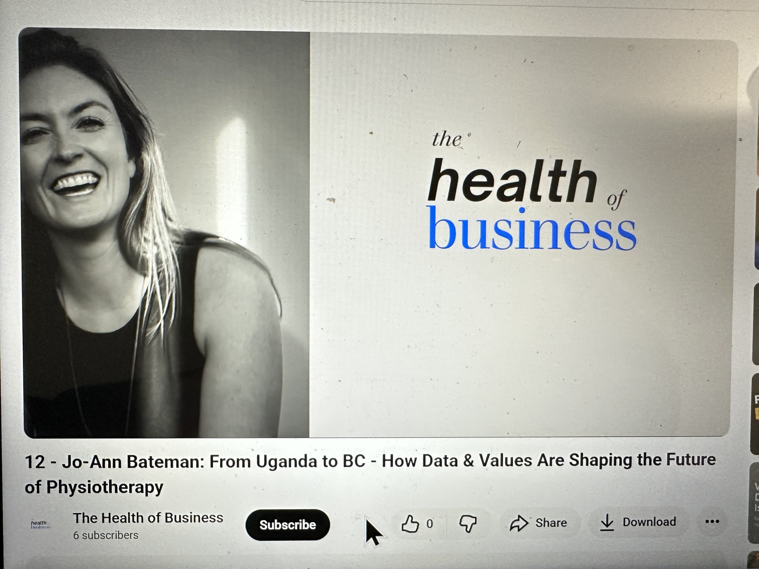 A woman with long blonde hair, smiling, wearing a sleeveless top, shown in a black-and-white photo on the left side of a presentation slide. The slide's text reads, 'the health of business,' with 'health' in bold black and 'business' in blue. Under the slide, there is a title: 'Jo-Ann Bateman: From Uganda to BC - How Data & Values Are Shaping the Future of Physiotherapy.'