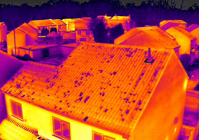 Thermal drone image of roof showing areas of heat loss