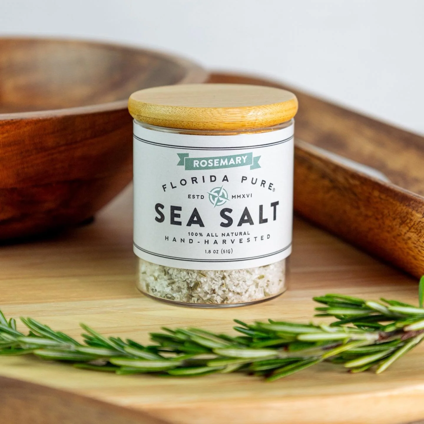 Every detail matters in product photography, from lighting to styling to the way ingredients are framed. This shot of floridapureseasalt Rosemary Sea Salt was created to showcase the freshness and bold flavor inside the jar.