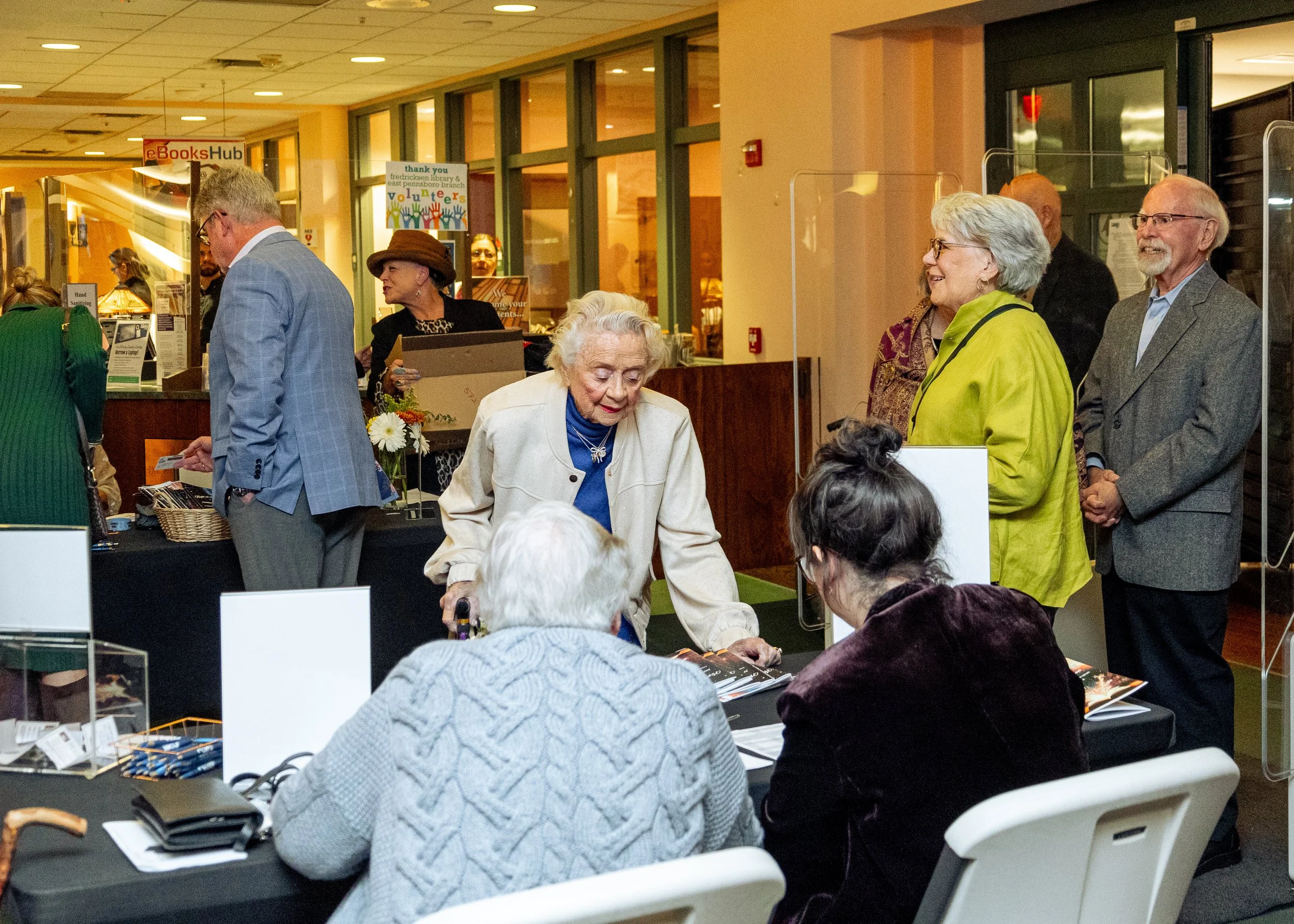 Guests signing in at the Night at the Library Event at Fredricksen