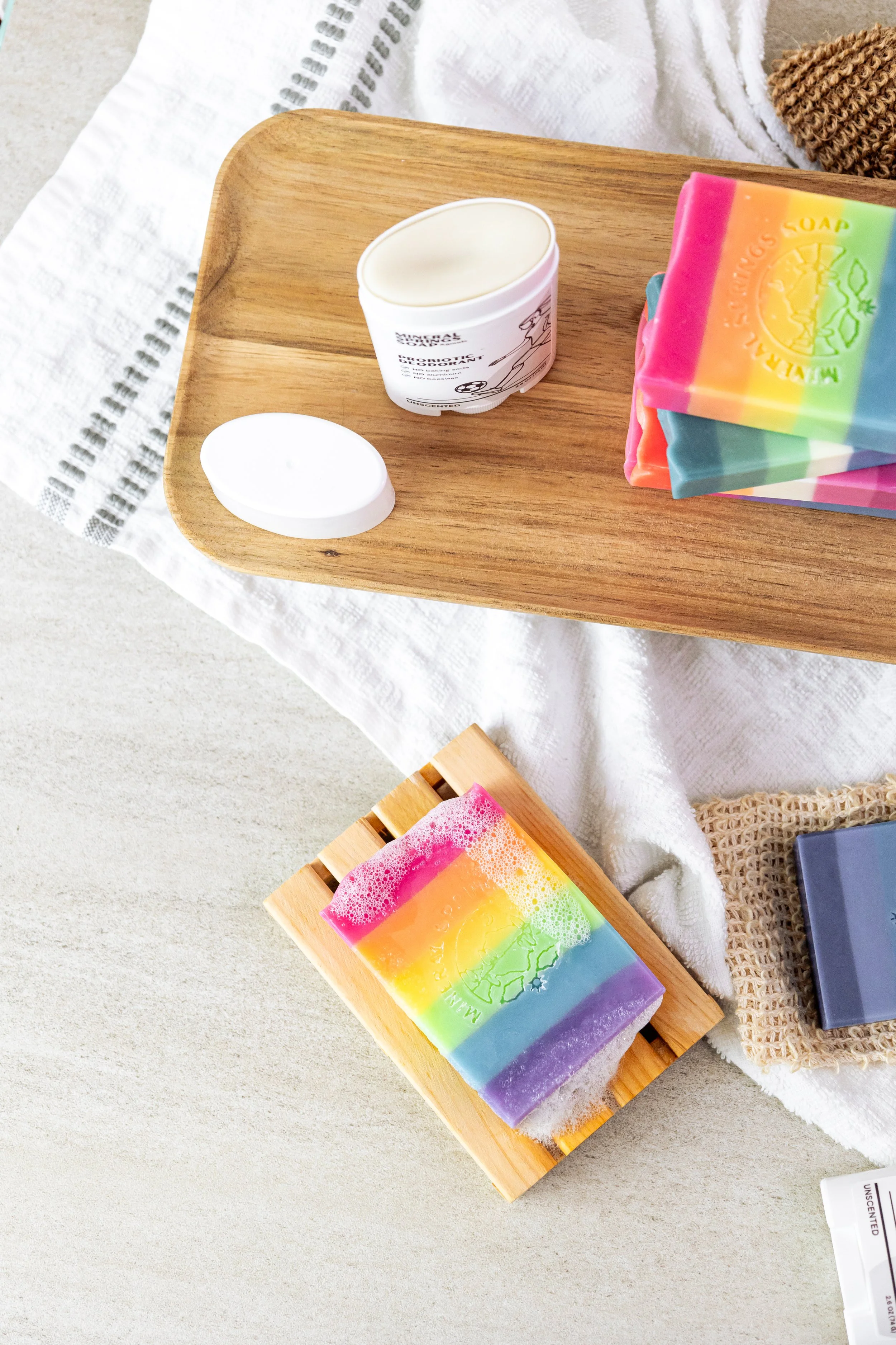 Product photography of handcrafted Mineral Springs Soaps highlighting layered colors, texture, and detail in clean, natural styling.