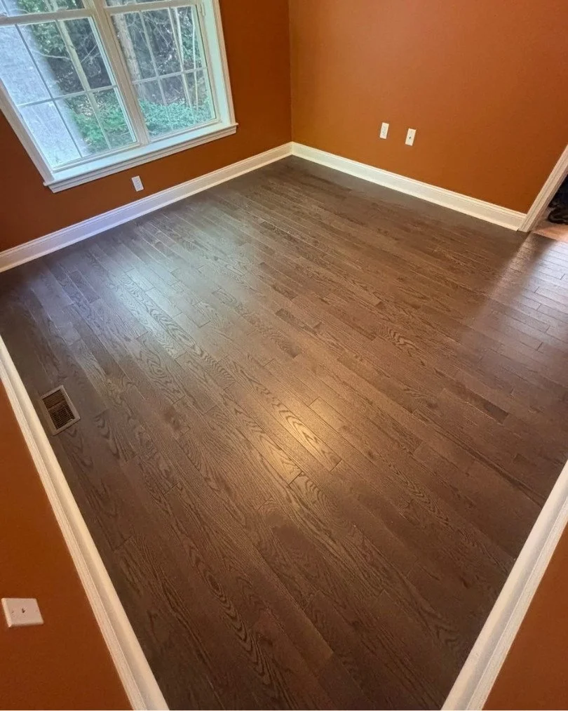 Professional engineered hardwood flooring installation with dark oak planks, seamless finish, and long-lasting performance for residential homes.