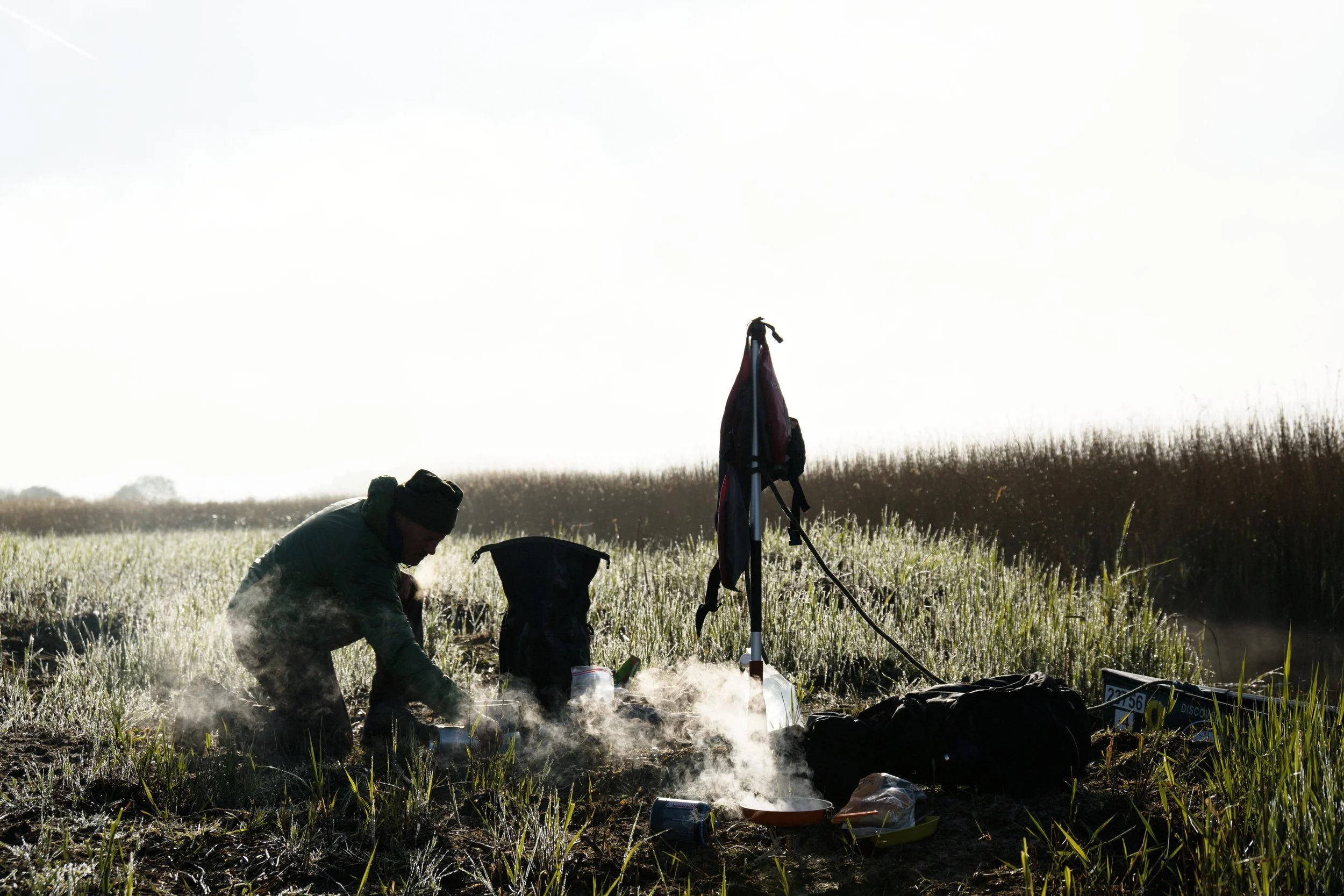 Cooking breakfast on a canoe expedition on the Norfolk broads