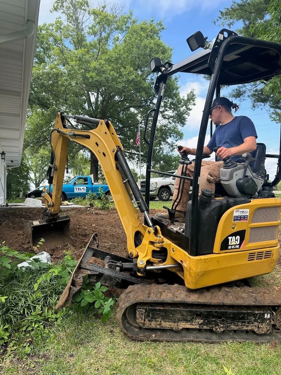 Jet Foundation Repair uses an excavator to repair a foundation in creve coeur mo.