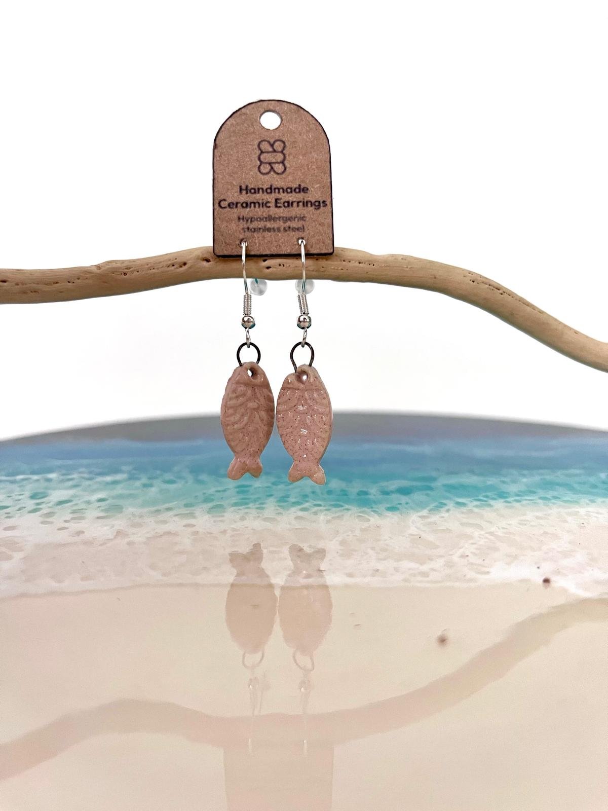 Pink fish earrings.jpeg