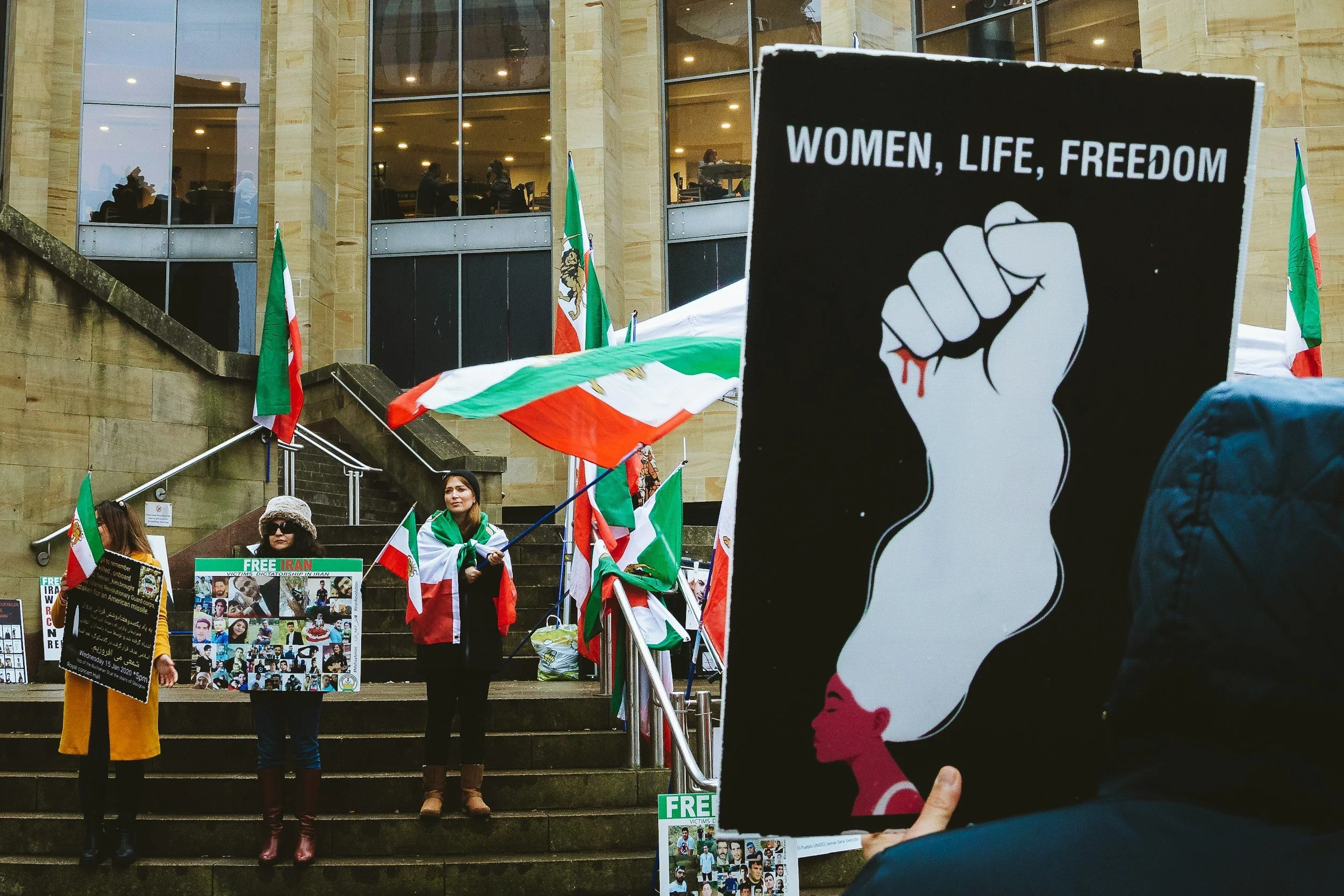 Woman Life Freedom movement highlighting the psychological impact of oppression on Iranian women and the lack of trauma-informed support.