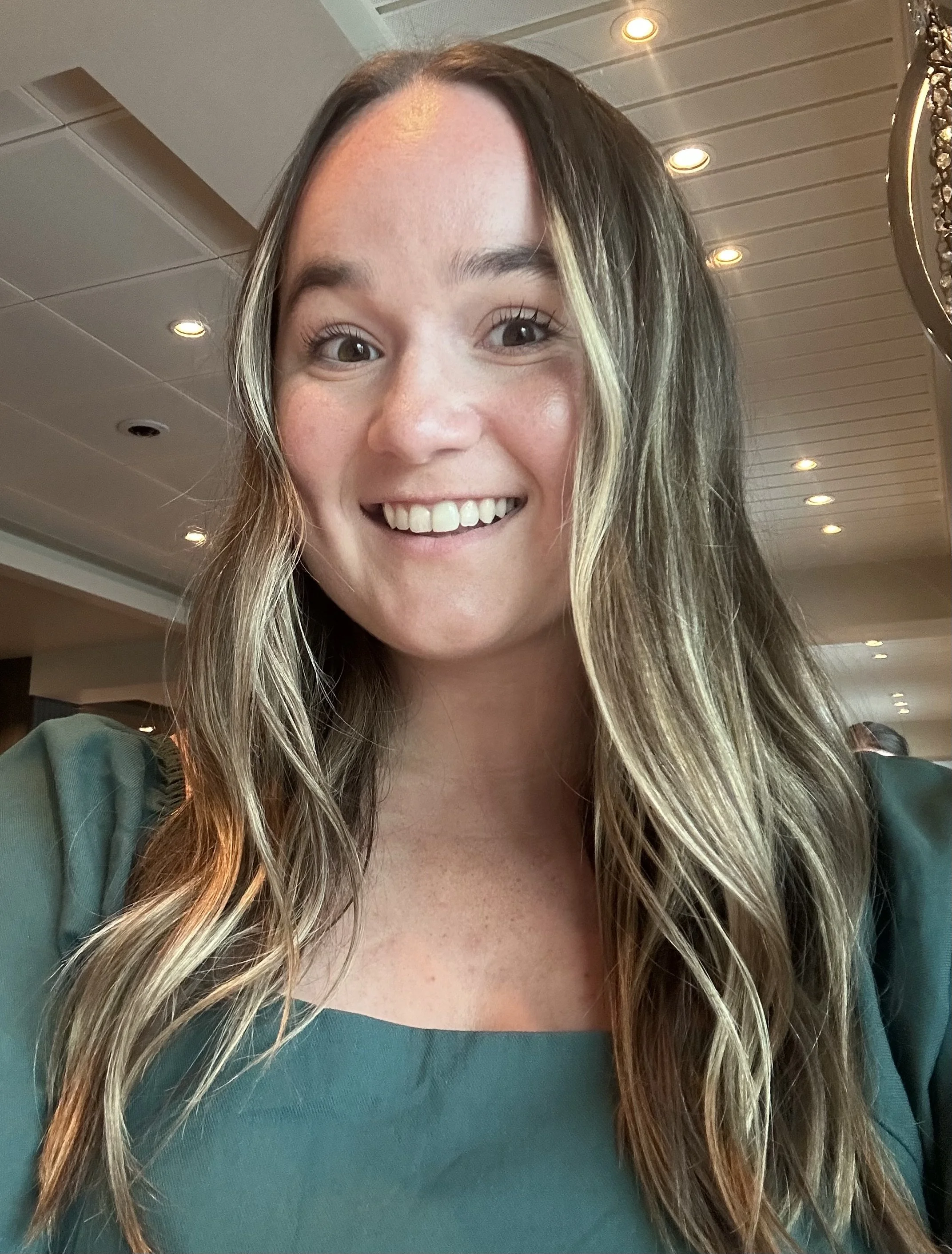 A headshot of our virtual school teacher