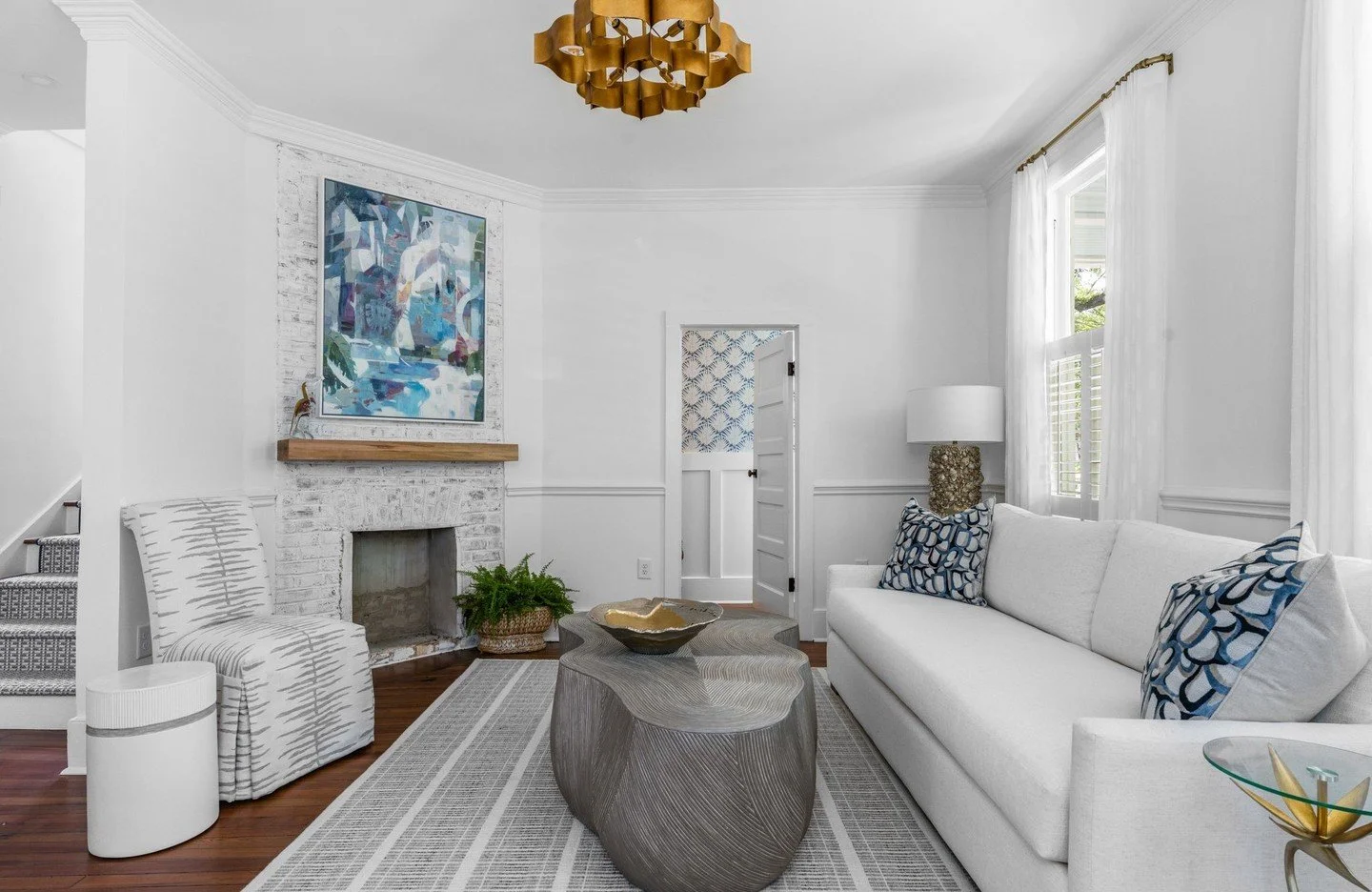 ✨Cozy meets contemporary in this coastal living room.⁠
Layered textures, bold patterns, and sculptural elements bring warmth and personality to this bright space. From the organic coffee table and playful pops of blue, every piece was hand-selected t