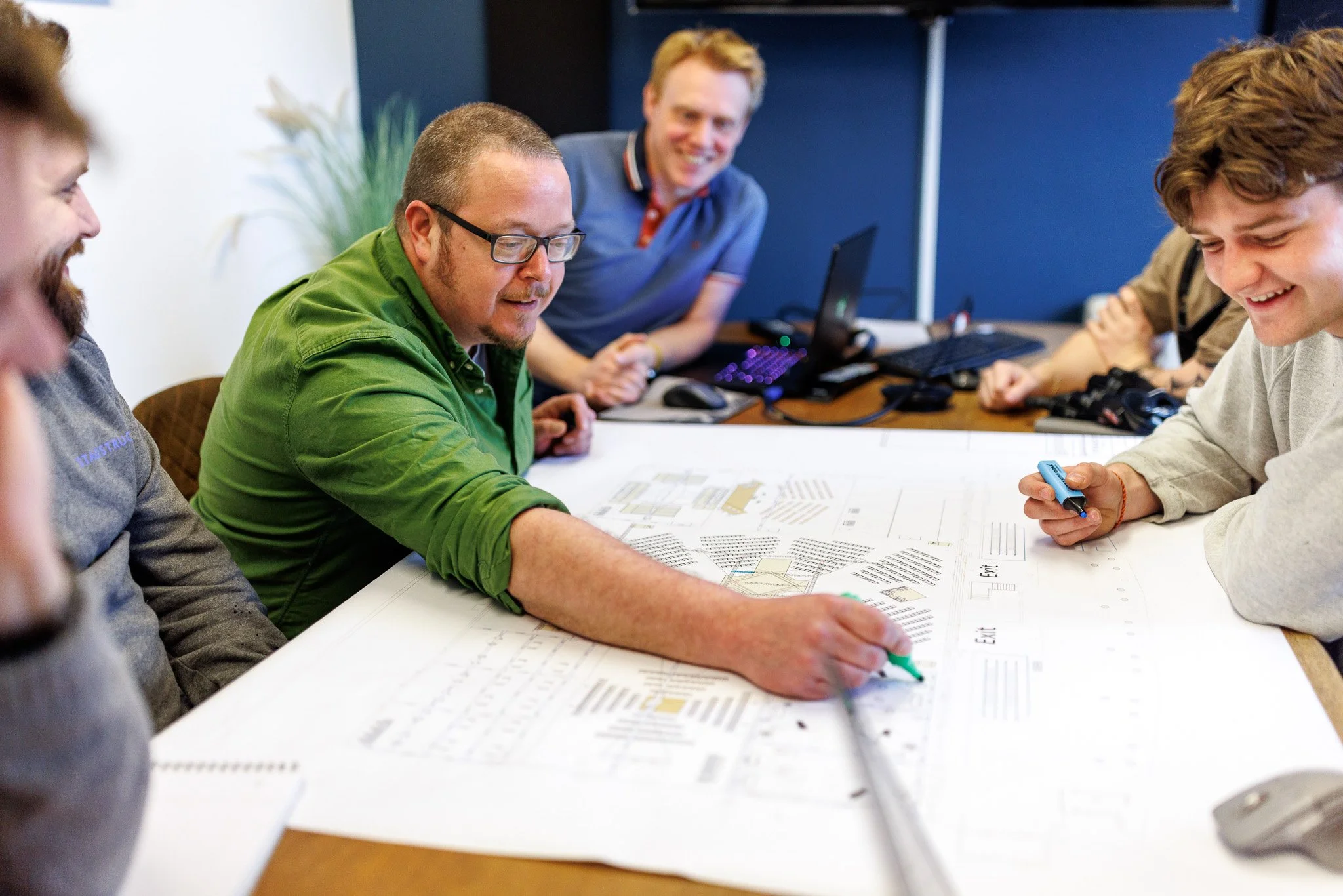 Corporate event photographer London working with event team during conference planning