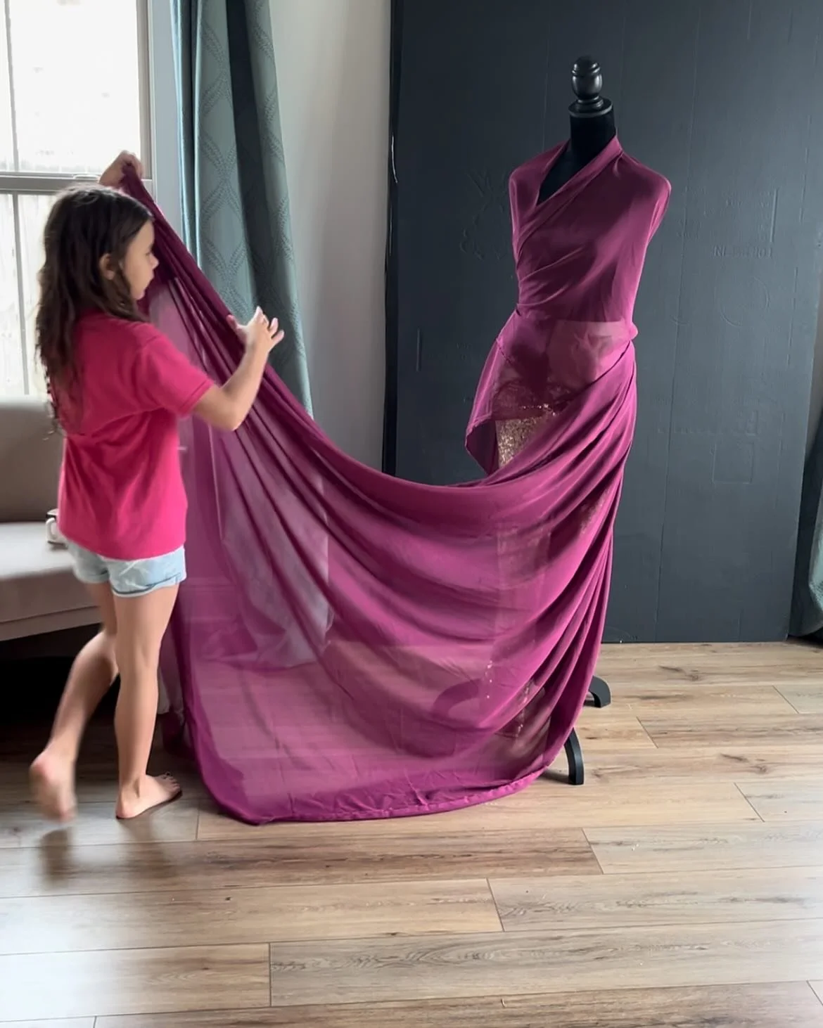 My mini, designing magic! ✨ With just one long piece of silk chiffon, she created two completely different dresses. Watching her imagination come to life is the best part&mdash; &lsquo;Mom! Come see what I&rsquo;m doing!&rsquo; Proud mom moment!