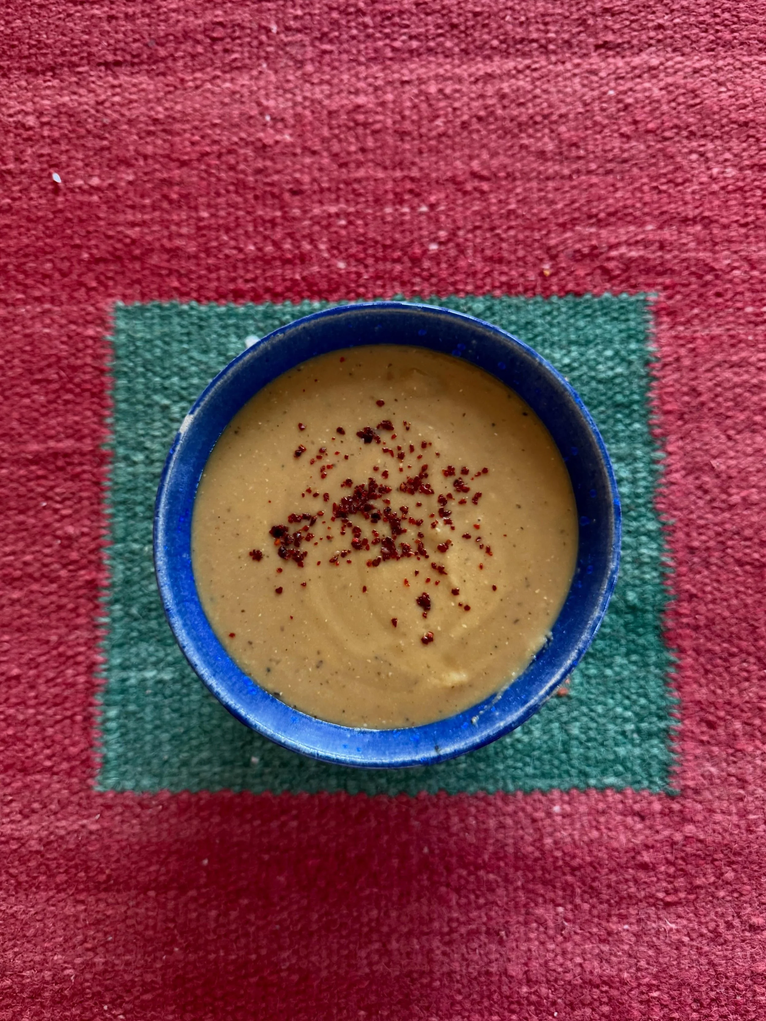 Big Pot of Lemony Lentil Soup 🥣

&bull; throw in whole smashed garlic cloves (8 ish) and roughly chopped fresh ginger (like a thumb size) with olive oil 
&bull; let that sizzle then throw in two bags of dried red lentils and a buncha spices (cumin p