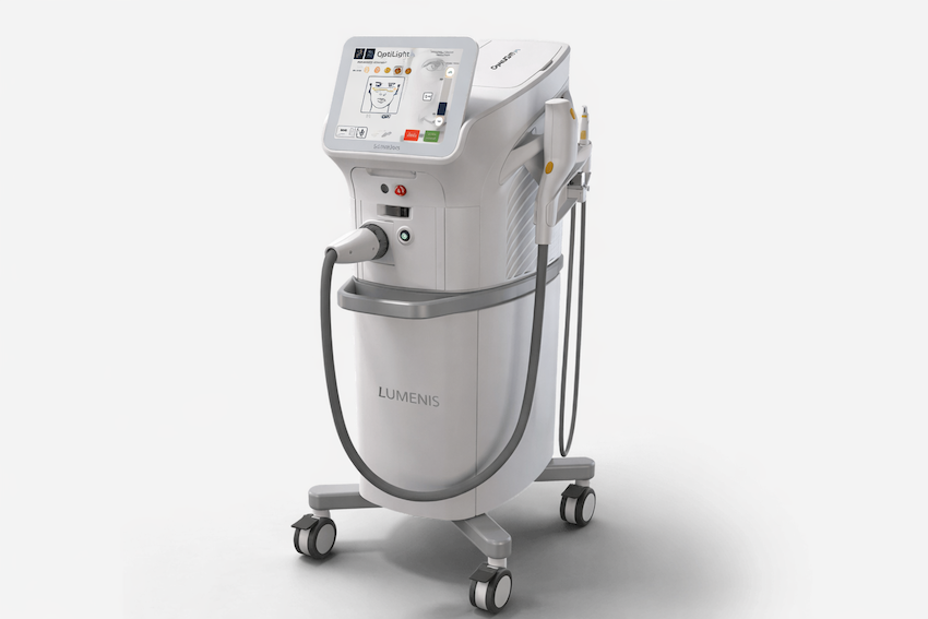 Medical device on wheels with digital display, labeled 'LUMENIS', used for skin treatments like laser or laser therapy.