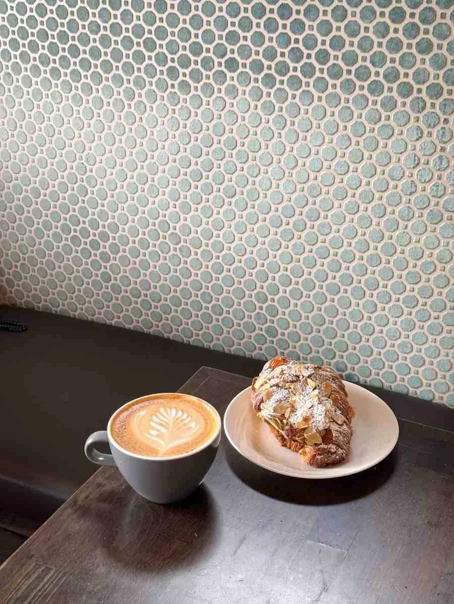 Coffee and almond croissant at Cafe 13