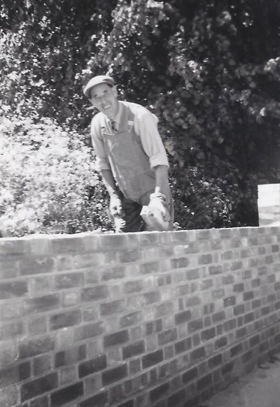 William John Mead - Founder, building a wall