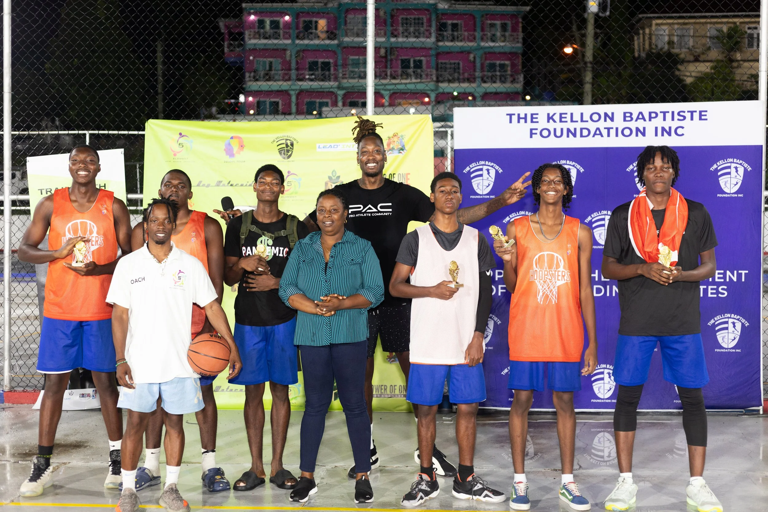 Awards to young male athletes at the closing of the inaugural basketball camp in Grenada W.I.