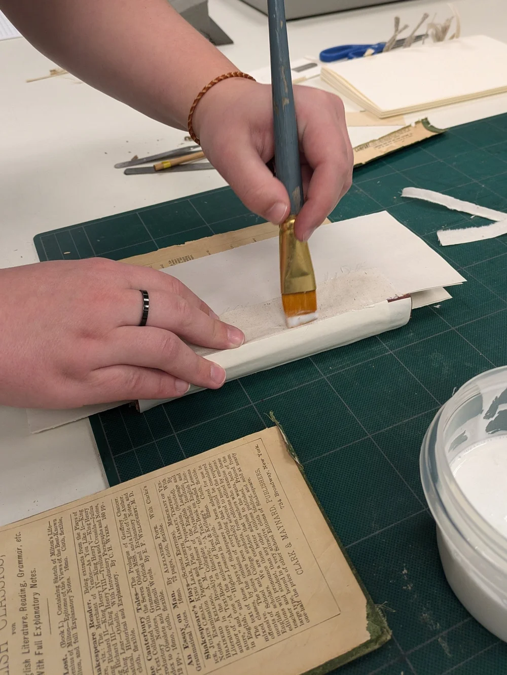 Spreading diluted PVA glue on Japanese tissue paper. 