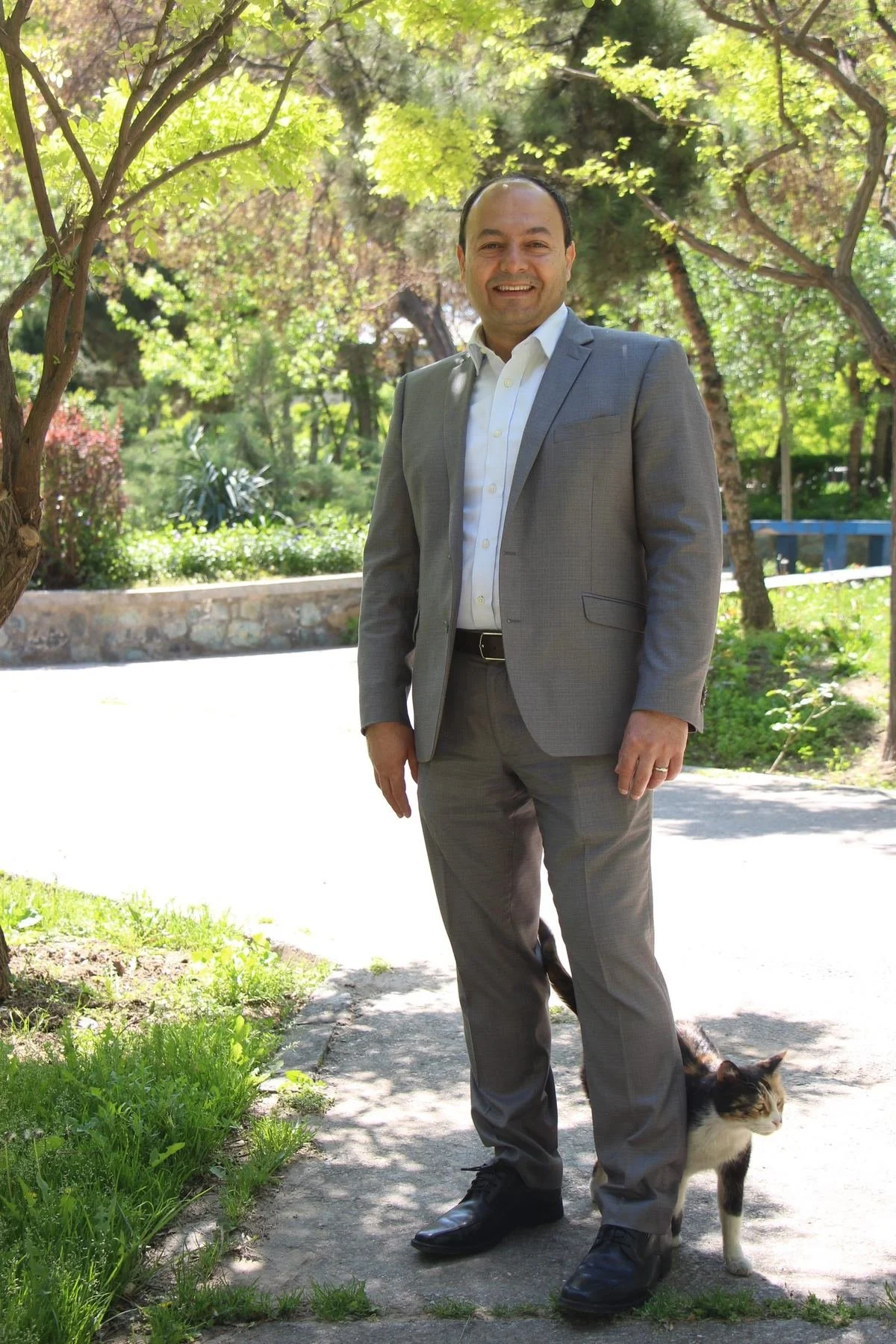 Javad Salehi Fadardi standing on a garden path