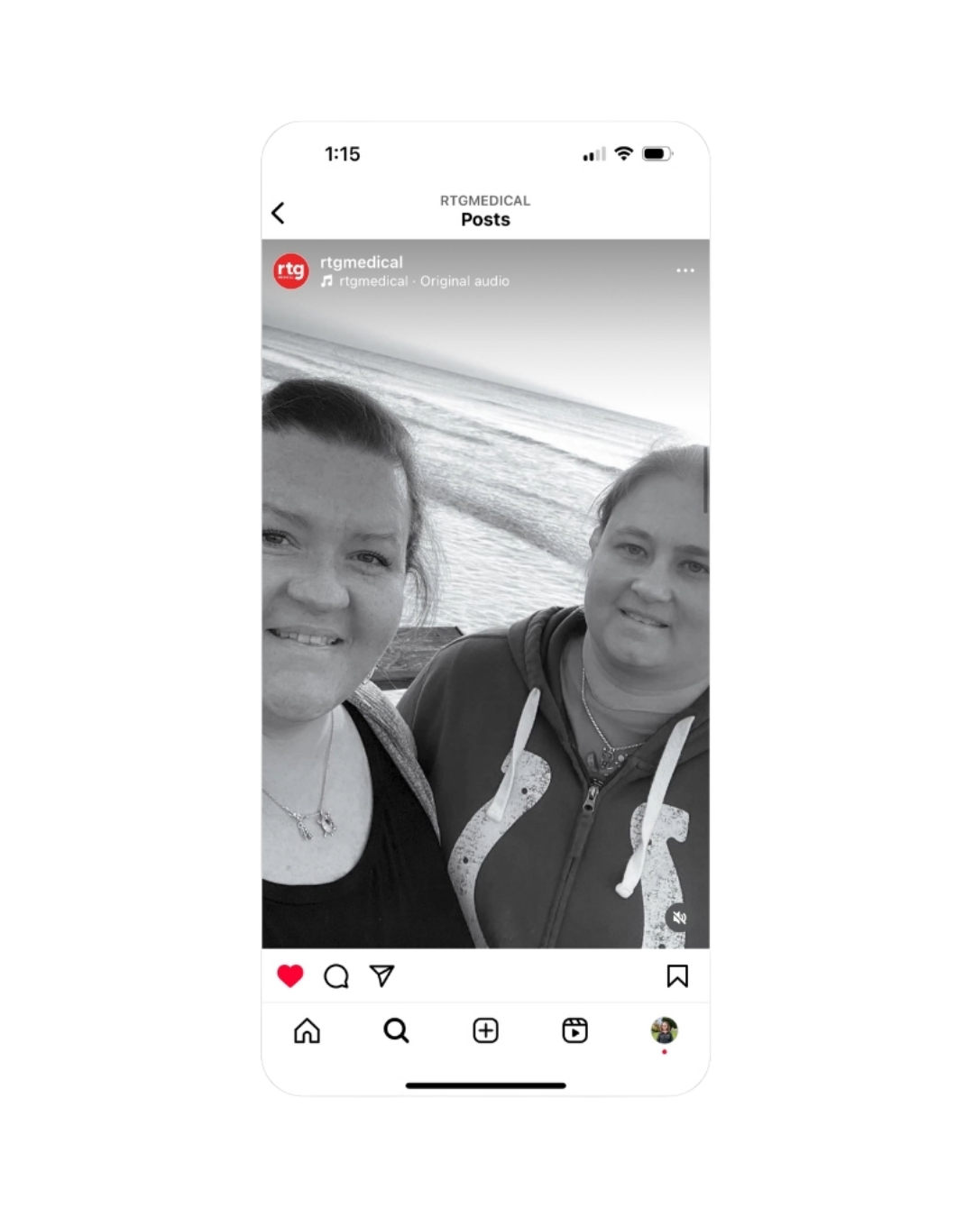 Phone mock-up 2:  A photo of two traveling nurses by a beach.