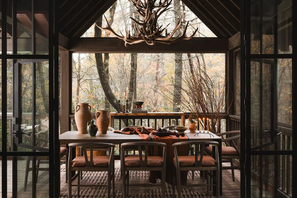 Transitional outdoor dining room, screened in porch