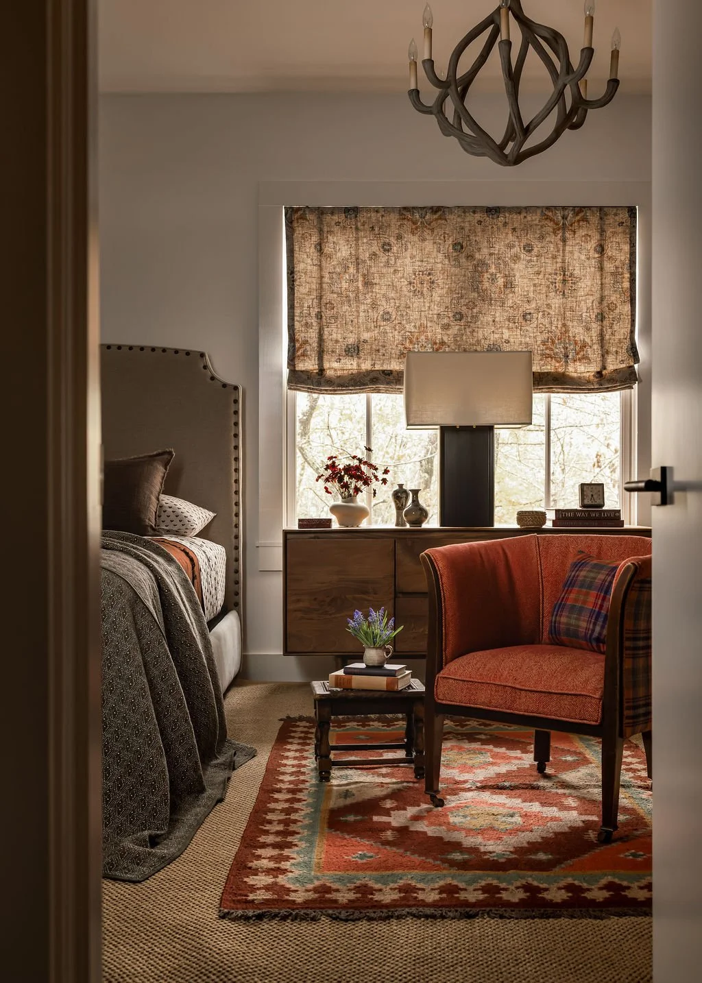 Mountain guest room with cozy layered textiles