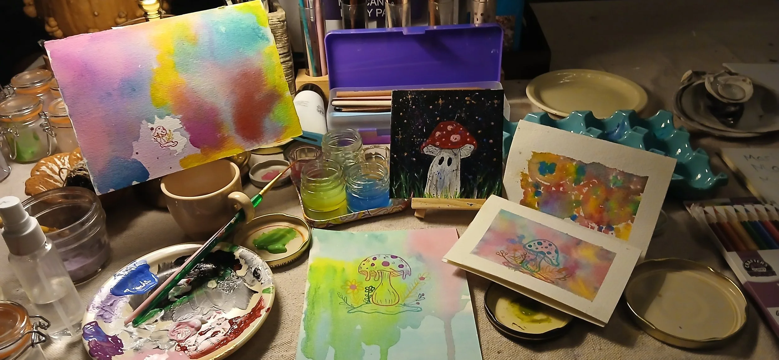 A table full of color and creativity! ( medium - water color & acrylic )  