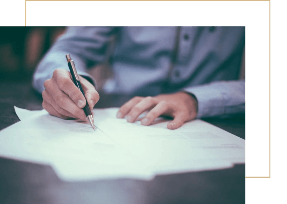 Business documents being reviewed for a Newton, MA business.