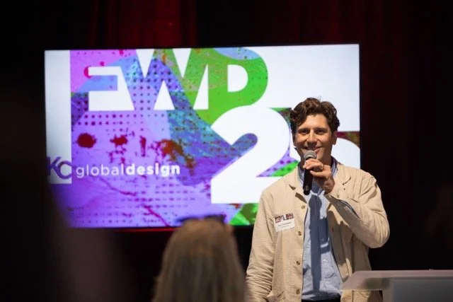 man speaking into a microphone