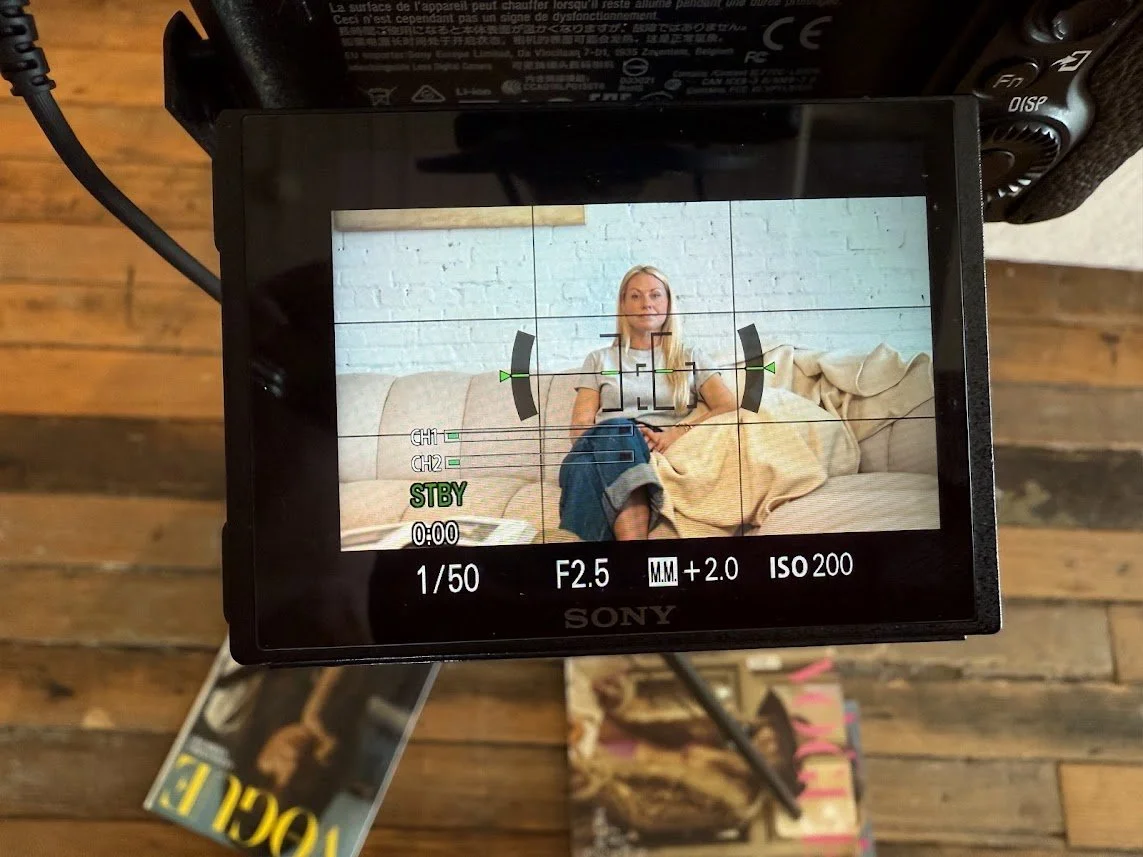 screen with a woman on camera