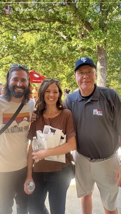 three people standing together