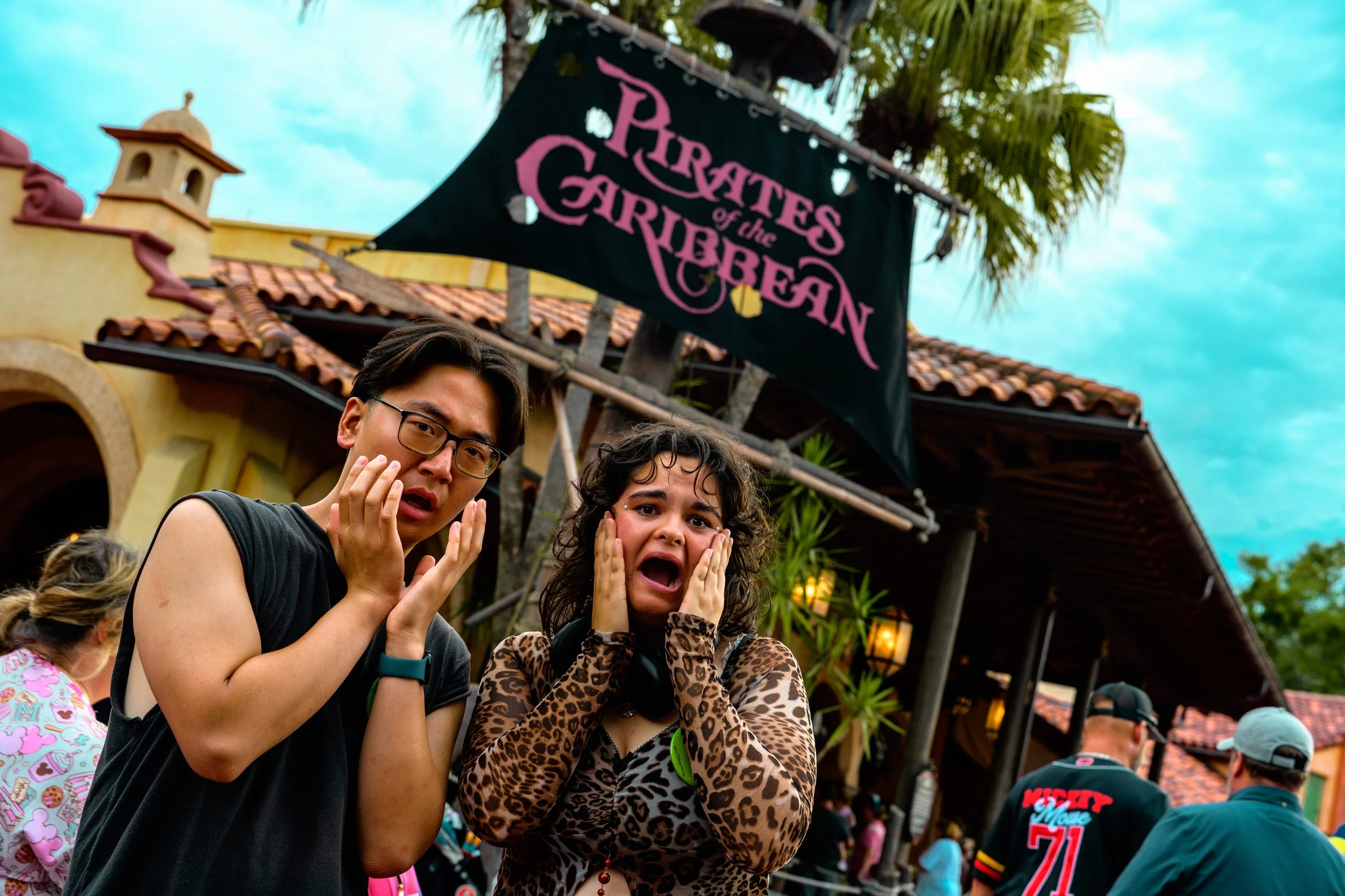 Two friends scared Infront of the pirates of the Caribbean Mast.