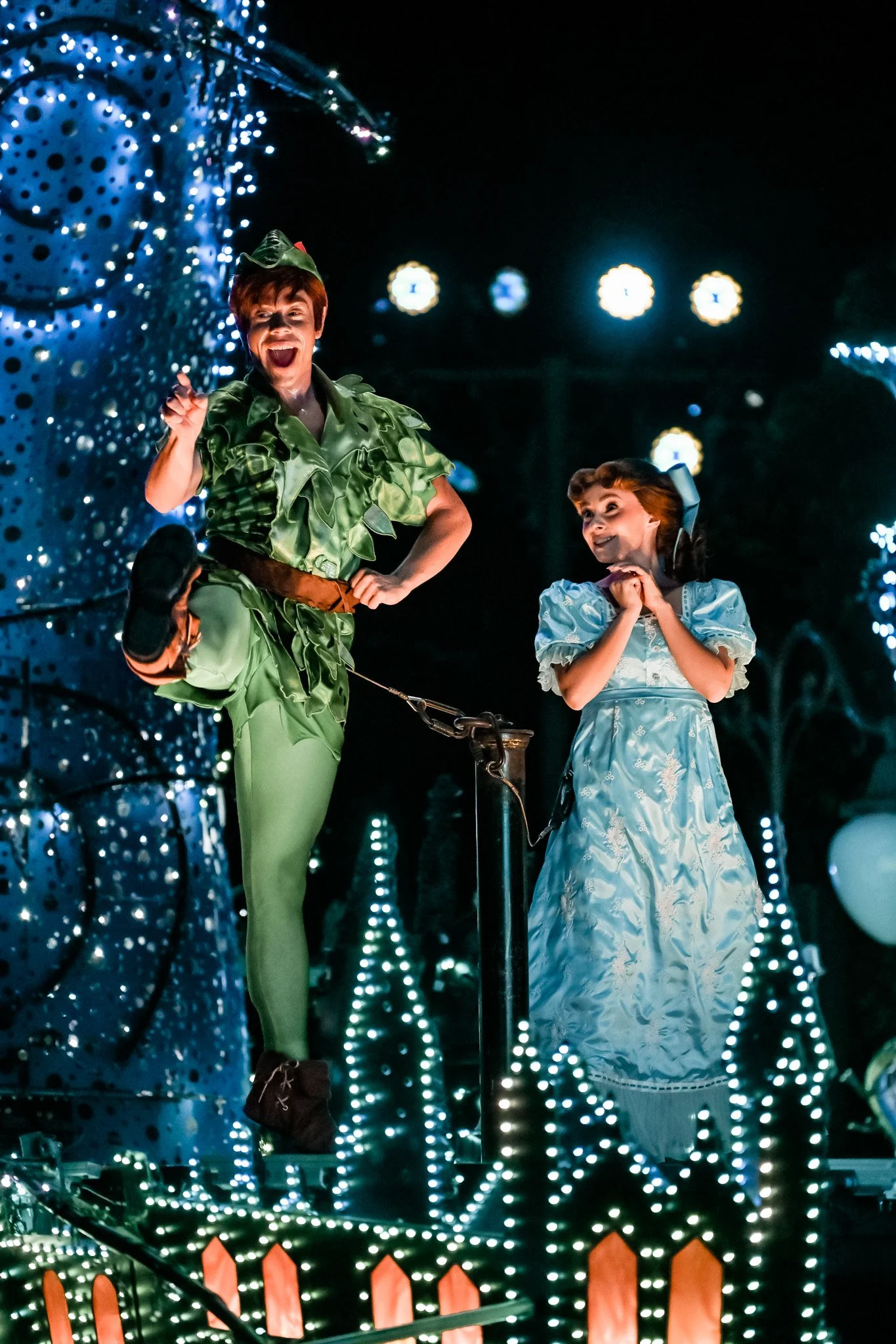 Peter Pan and Wendy on a decorated float during Disney's starlight.