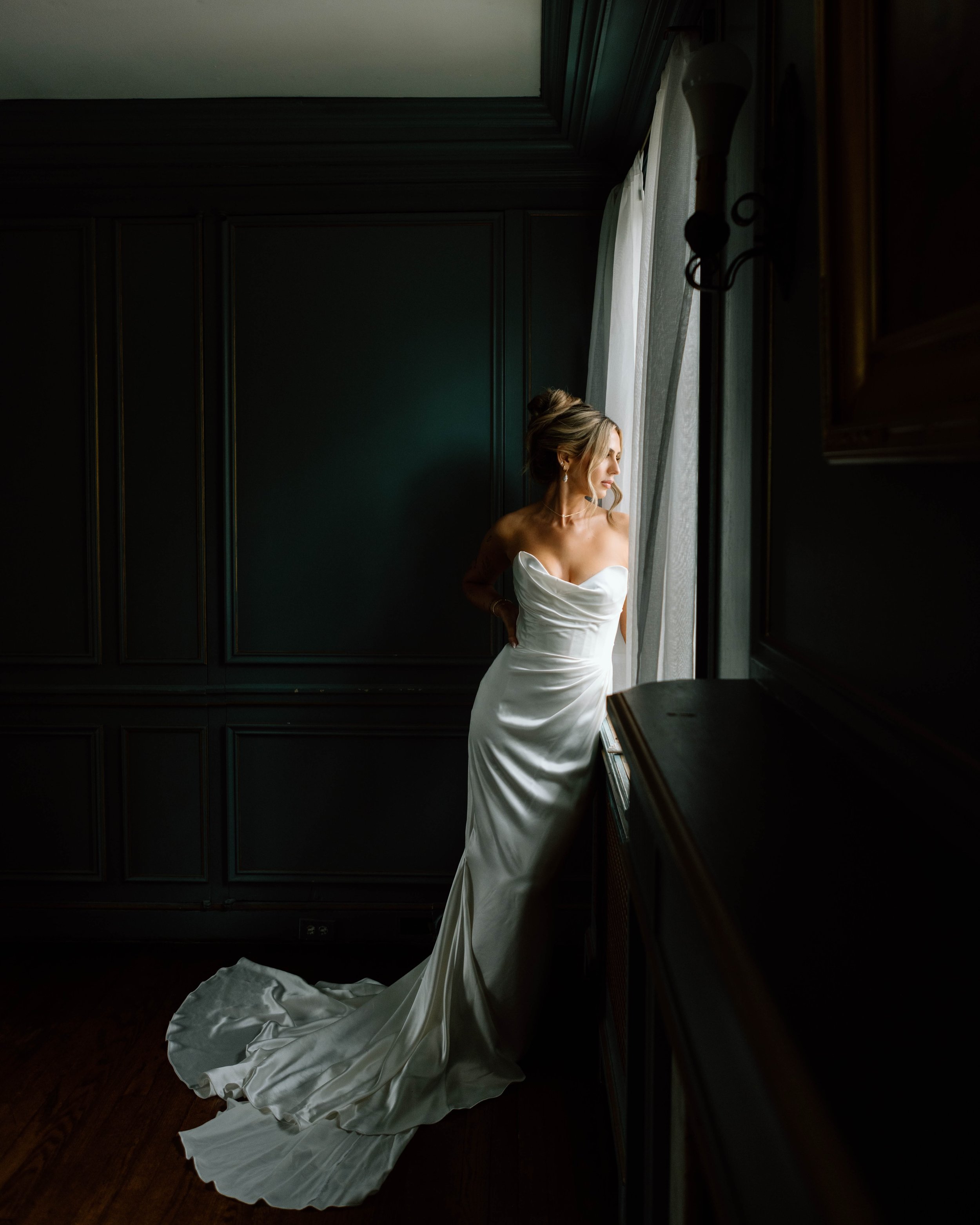 bride in front of window 