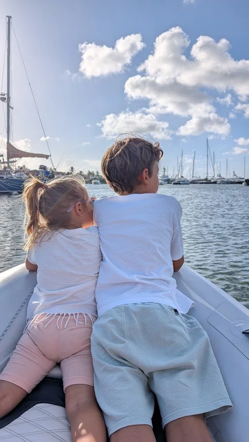 Evening dinghy rides back to the boat after a full day onshore!