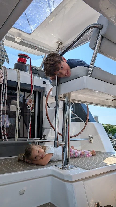 The kids loved playing around the boat as we did "boat jobs" and got used to their new home!