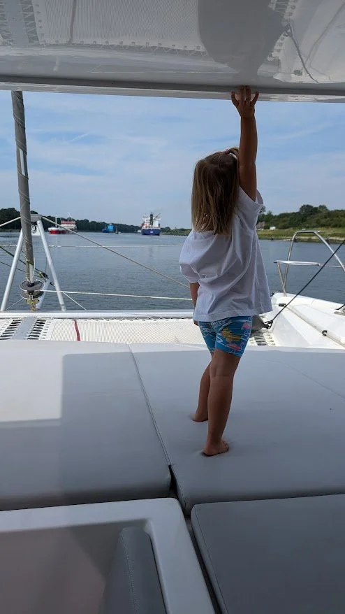 We thought the canal might be a relaxed passage, but you actually can't just turn the autopilot on and relax - so we took turns in steering but you have to keep an eye out for the ferries, ships, signs and bends in the canal!