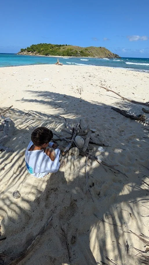 Making a play "fire pit" at Sandy Cay - the kids were pretending they were stranded!