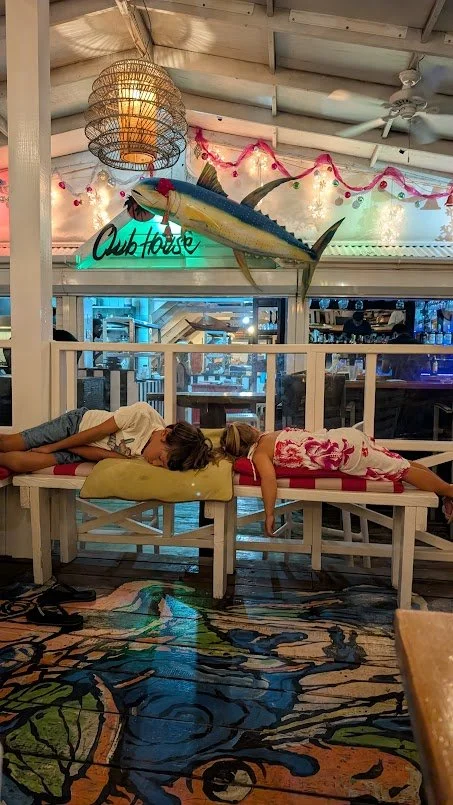 The kids found a comfy spot regardless of the blaring music and fell asleep!