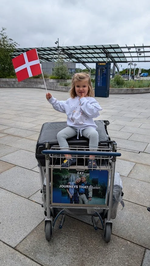 Our friend Julia greeted us in Copenhagen with a traditional Danish flag welcome at the airport!