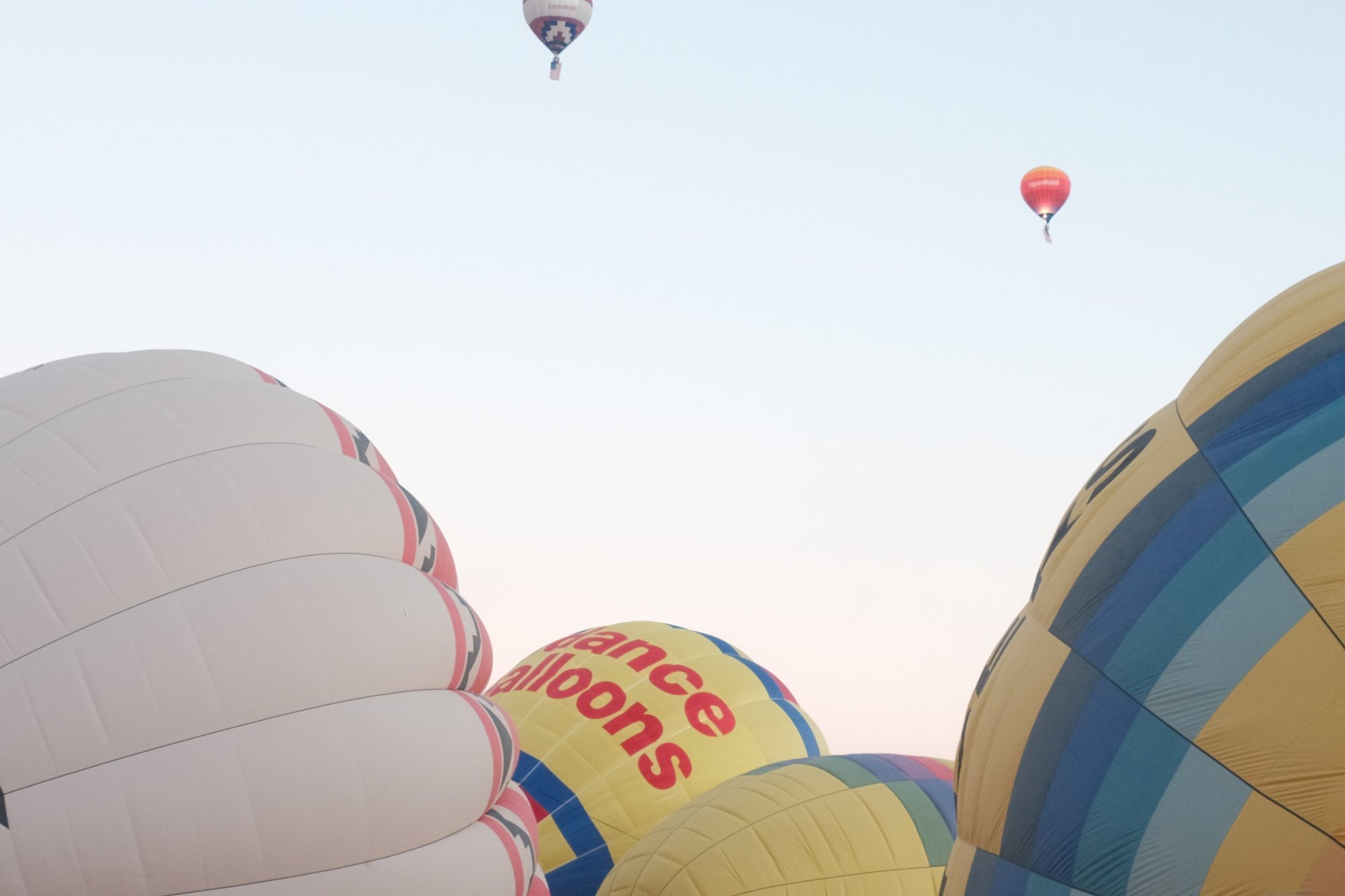 Balloon envelopes inflating in the early light