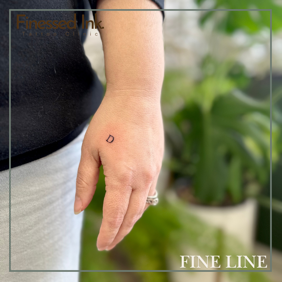 Fine line tattoo letters.png