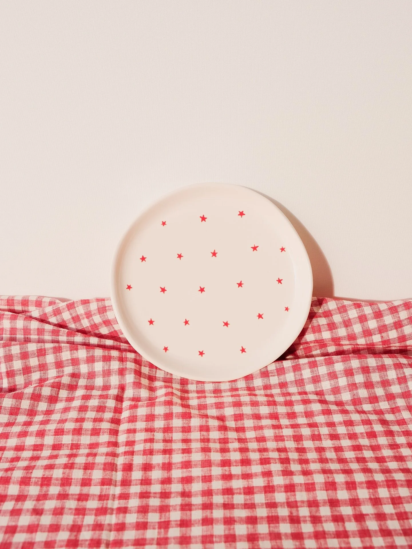 THE *party plates* (and matchy matchy ceramic cups) are officially available online!!! I&rsquo;m hand painting these @kimwallace.ceramics treasures specially for your celebrations (christmas or otherwise) ⭐️🥂🎂✨🍽️ I hope you liiiiiiike them 🫶🏼 I&