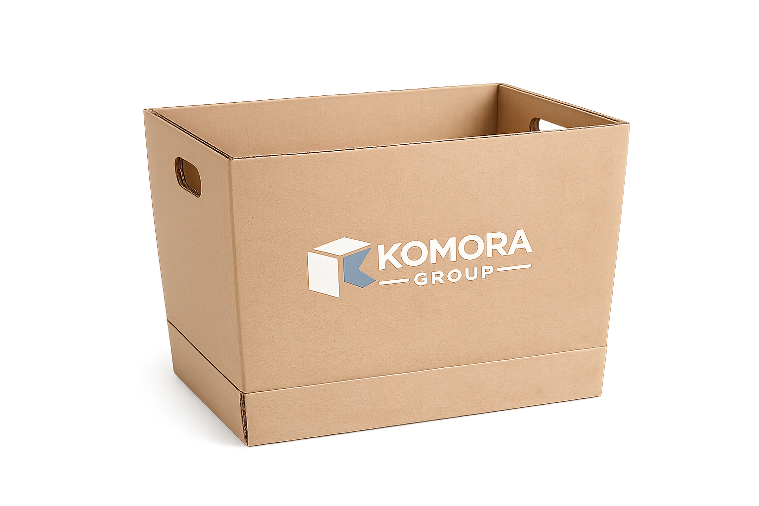 A cardboard storage bin with the Komora Group logo printed on the side, featuring a geometric design and text.