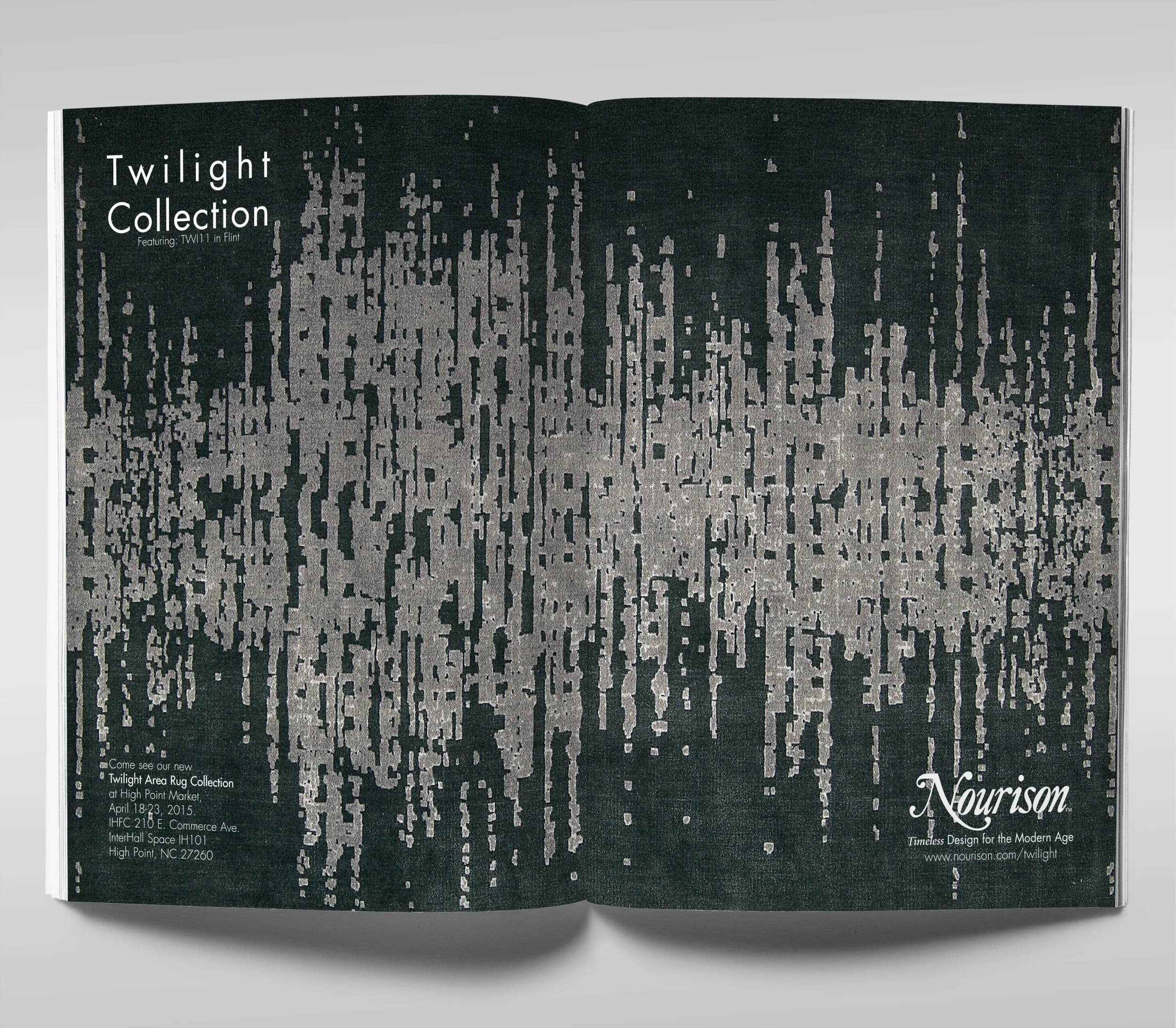 Open magazine displaying a modern abstract rug with digital-like pixelated pattern in black and gray, promoting the Nourison Twilight Collection.