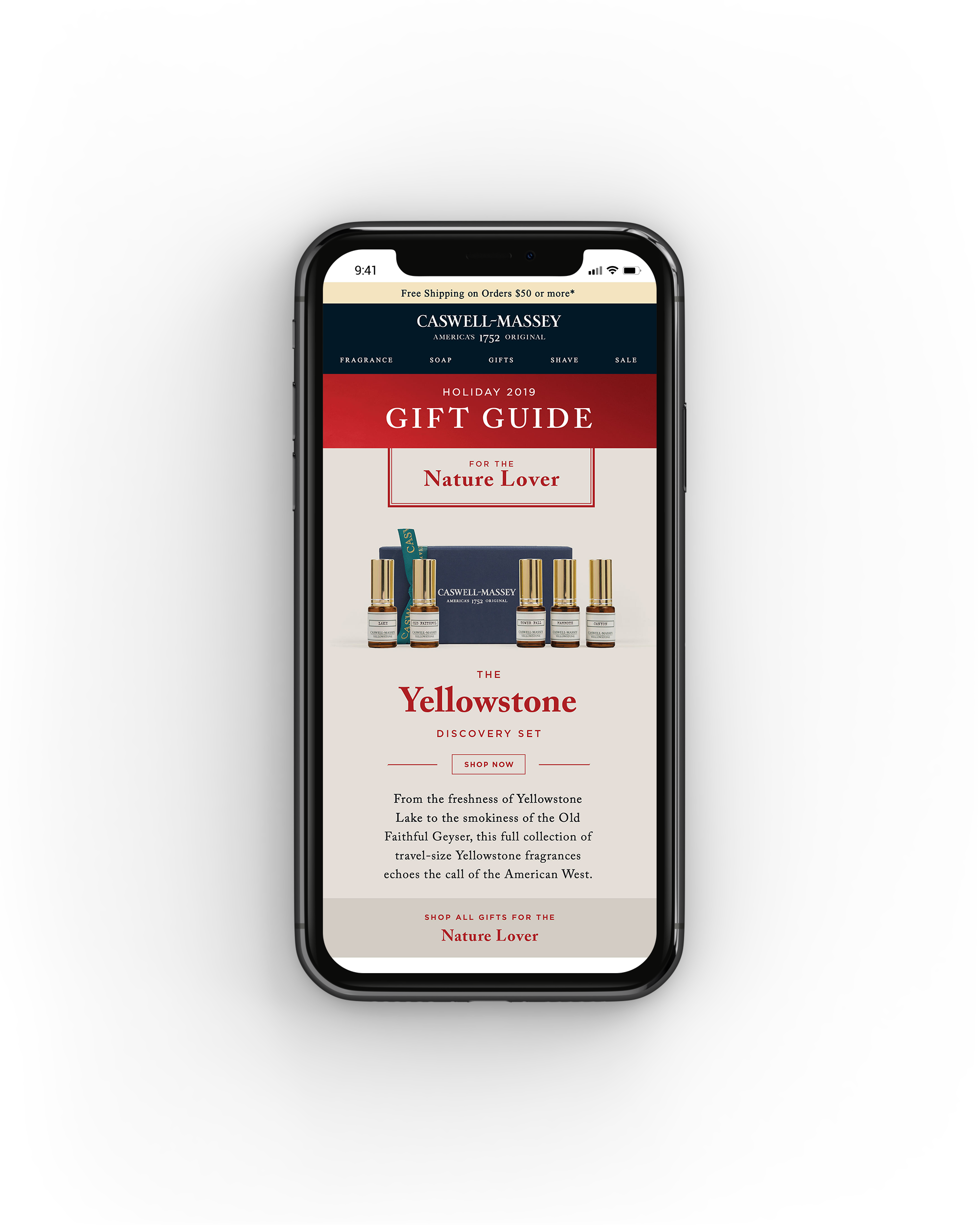 Mobile phone displaying Caswell-Massey's holiday gift guide webpage, featuring Yellowstone fragrance collection, with bottles and a blue box, against a black background.