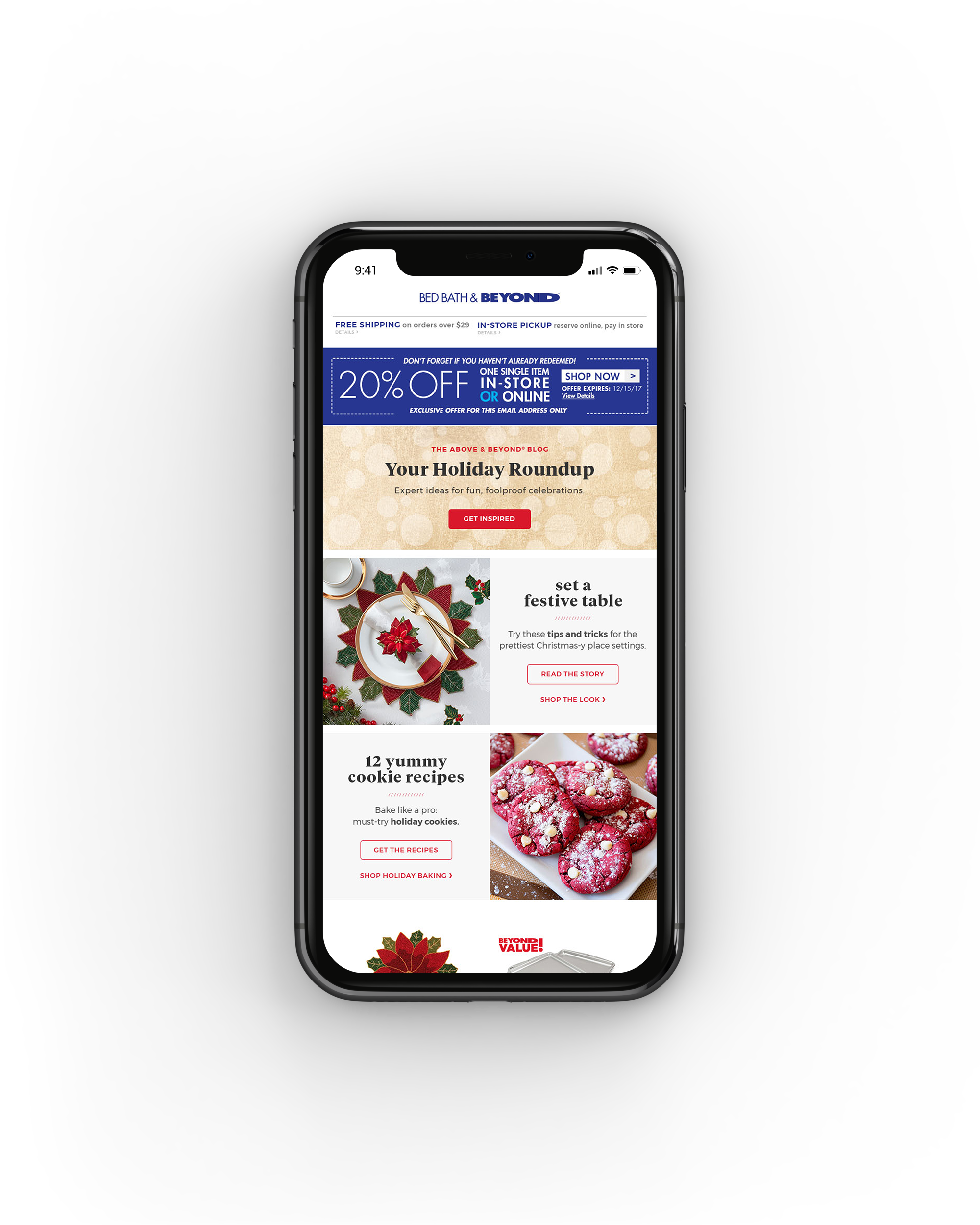 Mobile phone displaying the Bed Bath & Beyond website with holiday-themed content, including recipes, tips for setting a festive table, and a holiday blog.